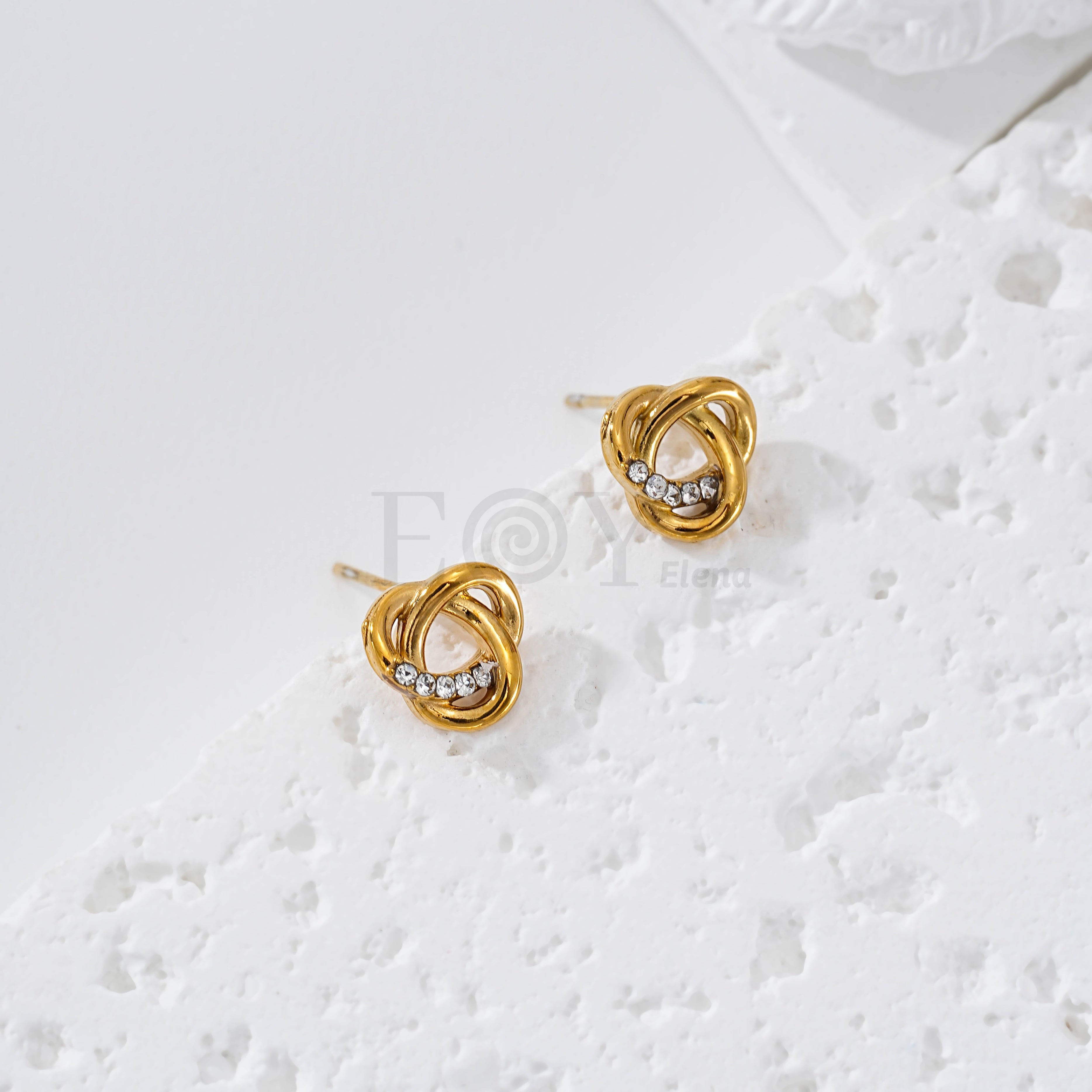 Pendientes nudo con circonitas acero