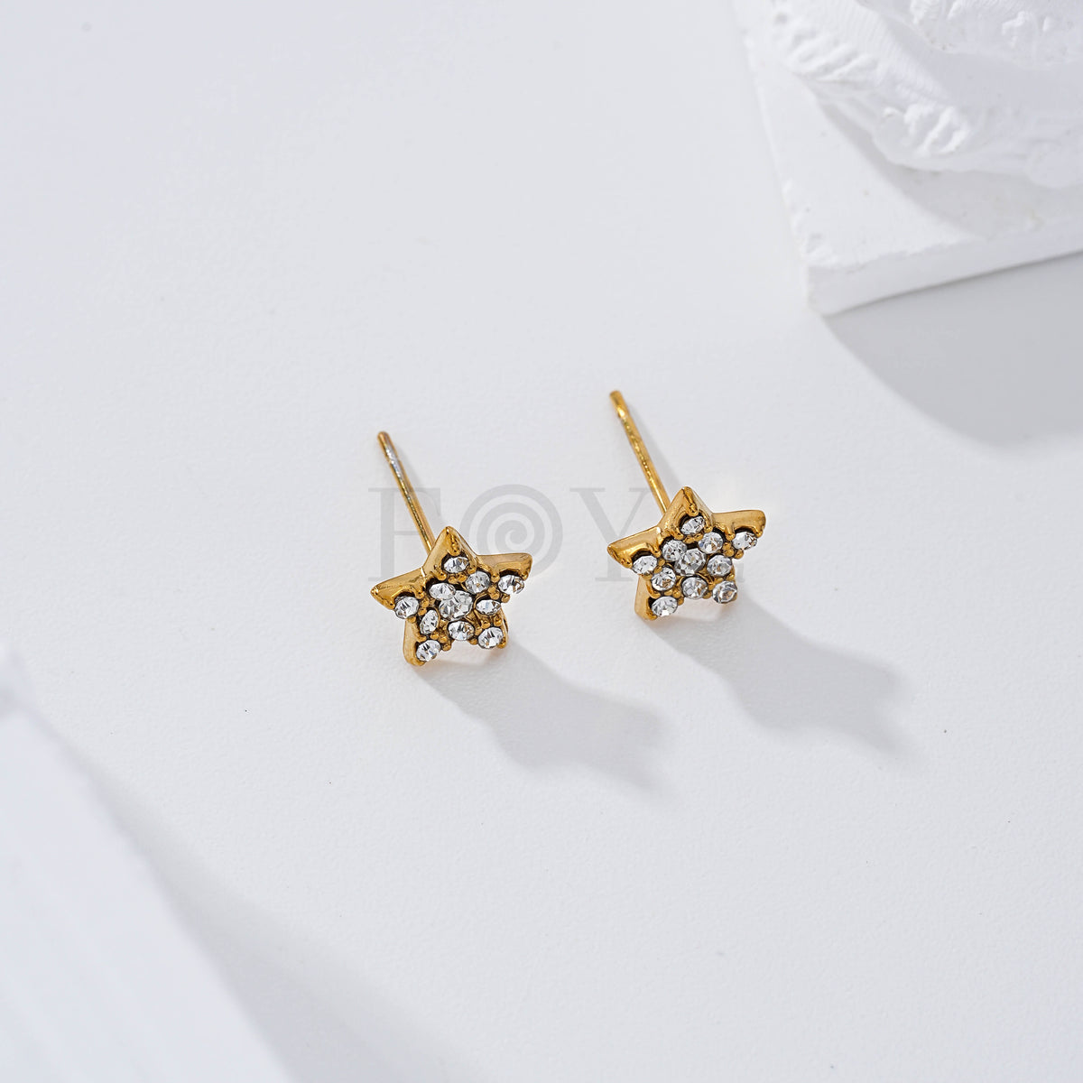 Pendientes estrella circonitas acero