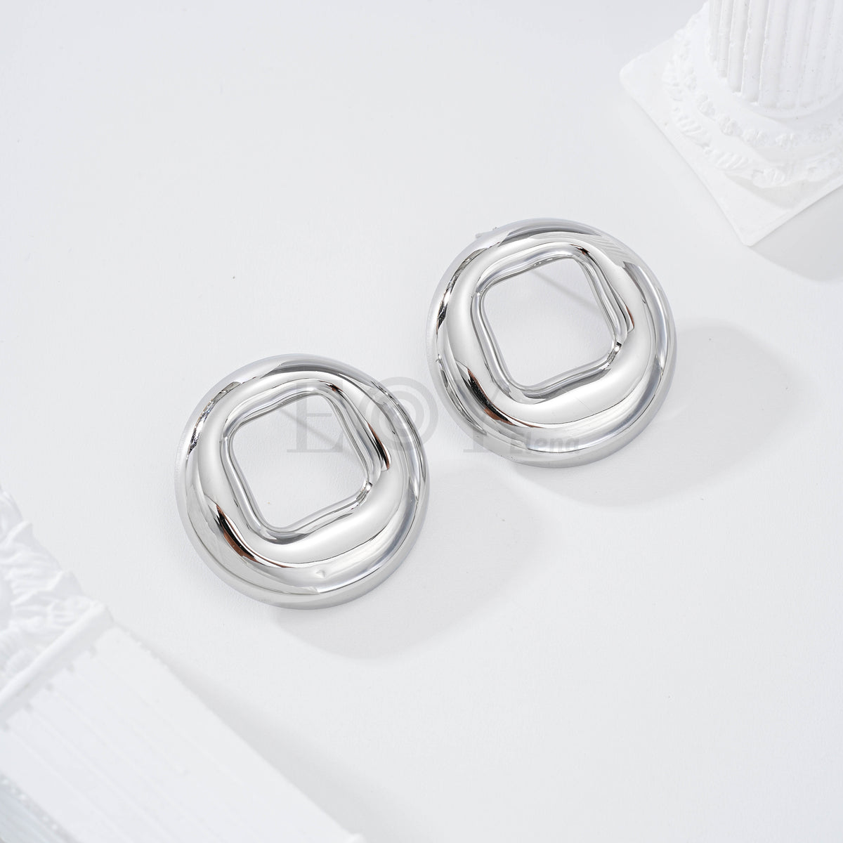 Pendientes redondo hueco acero