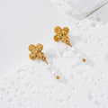 Pendientes flor con dos perlas colgantes acero