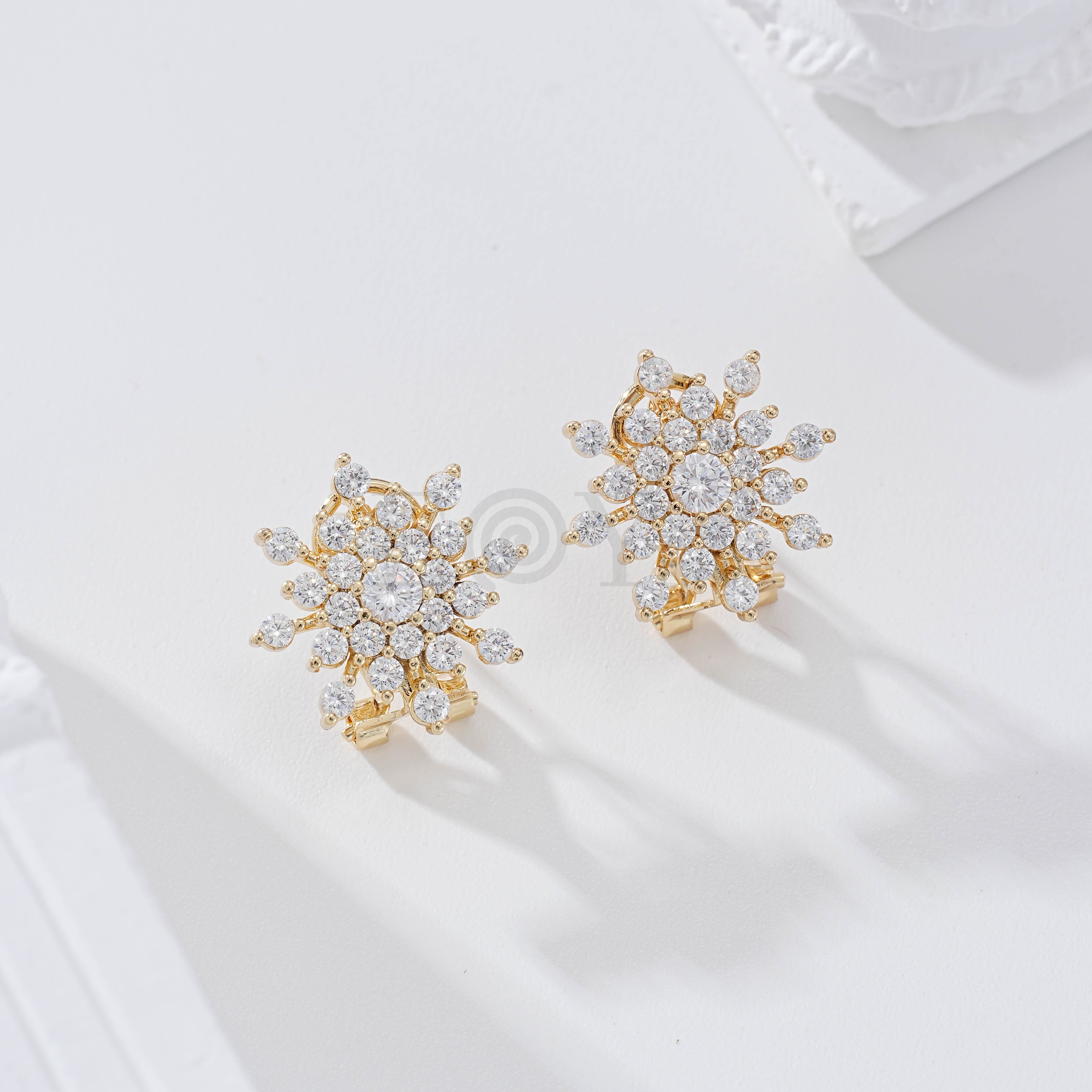 Pendientes flor circonitas cierre omega goldfield