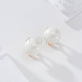 Pendientes perla cierre omega goldfield