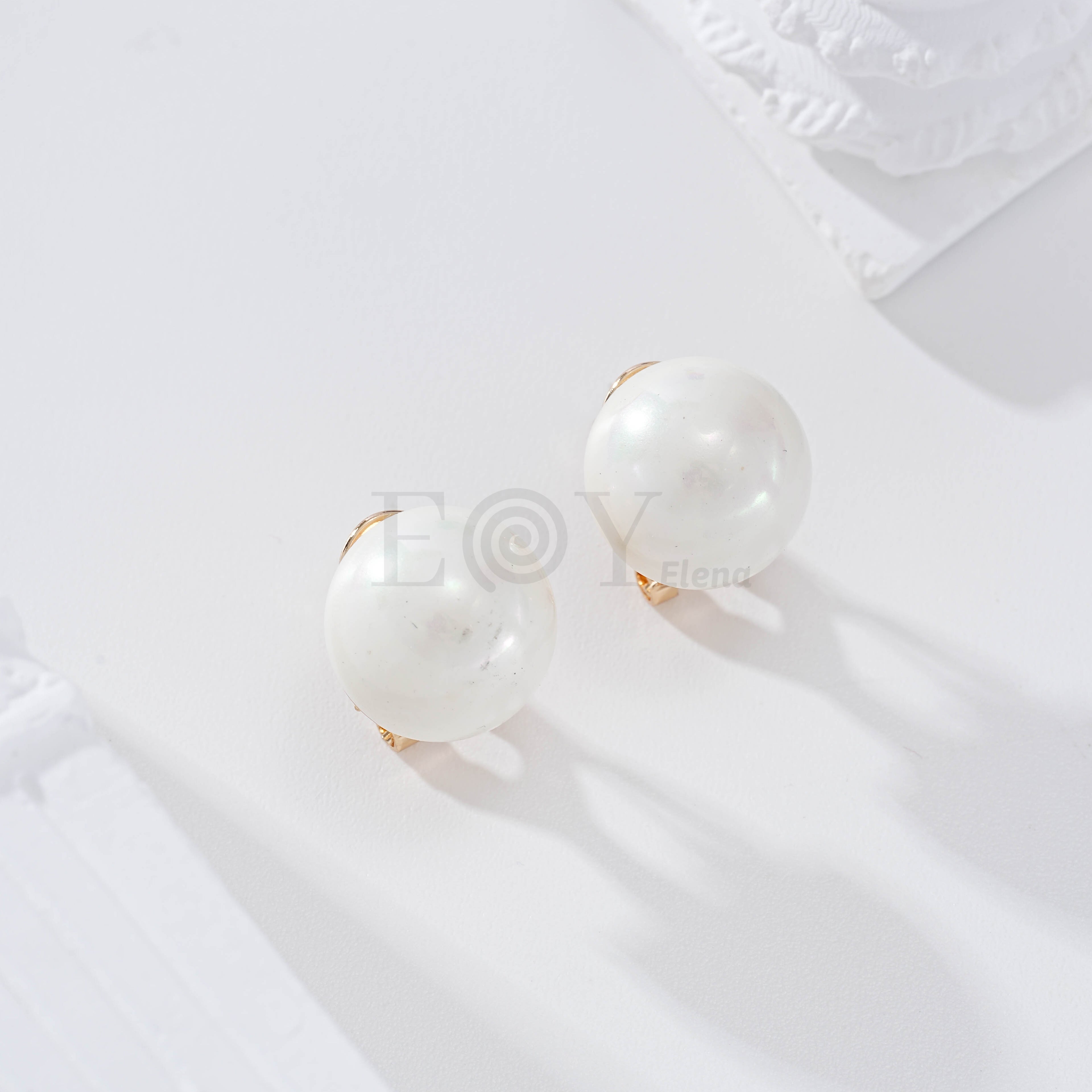 Pendientes perla cierre omega goldfield