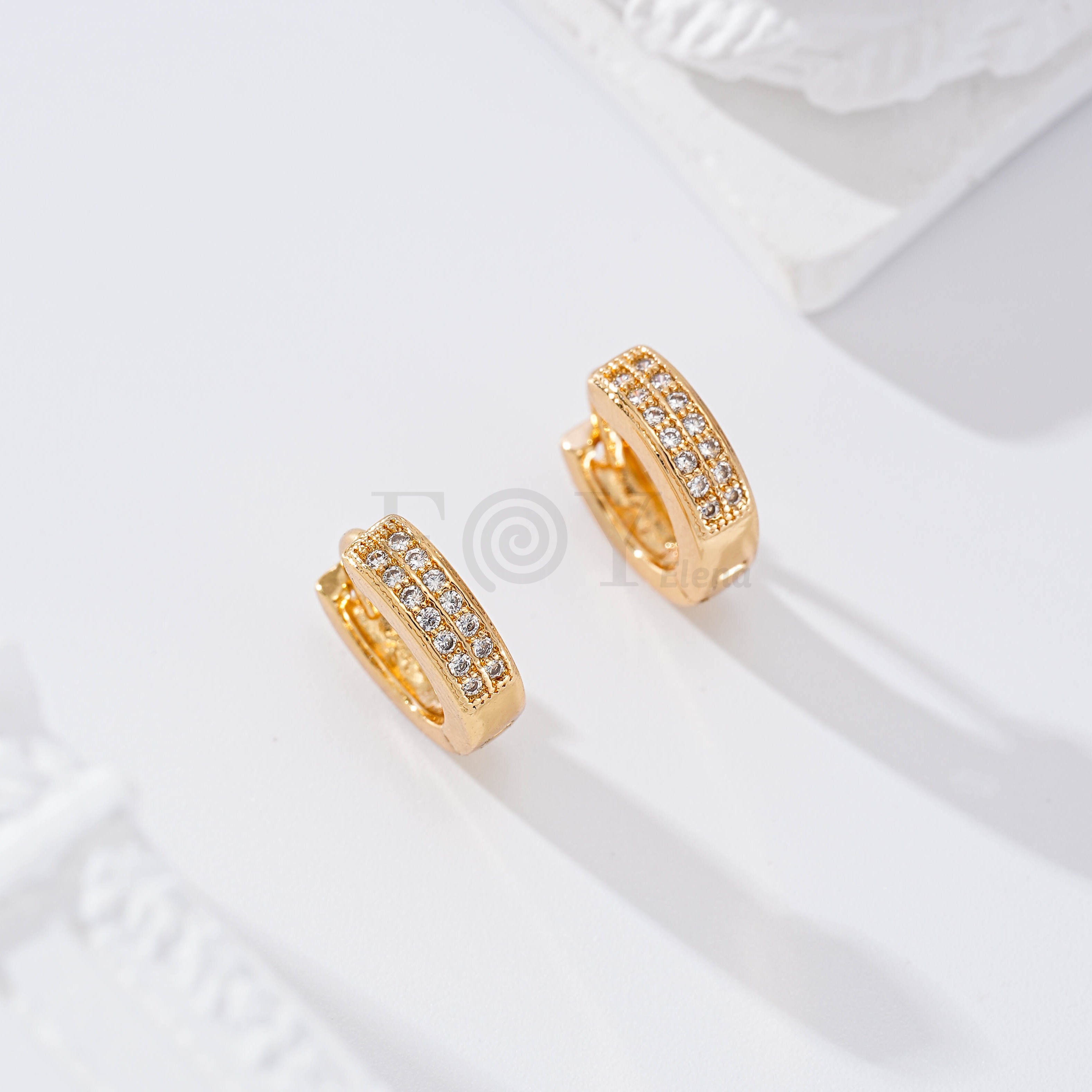 Aro doble barra circonitas goldfield