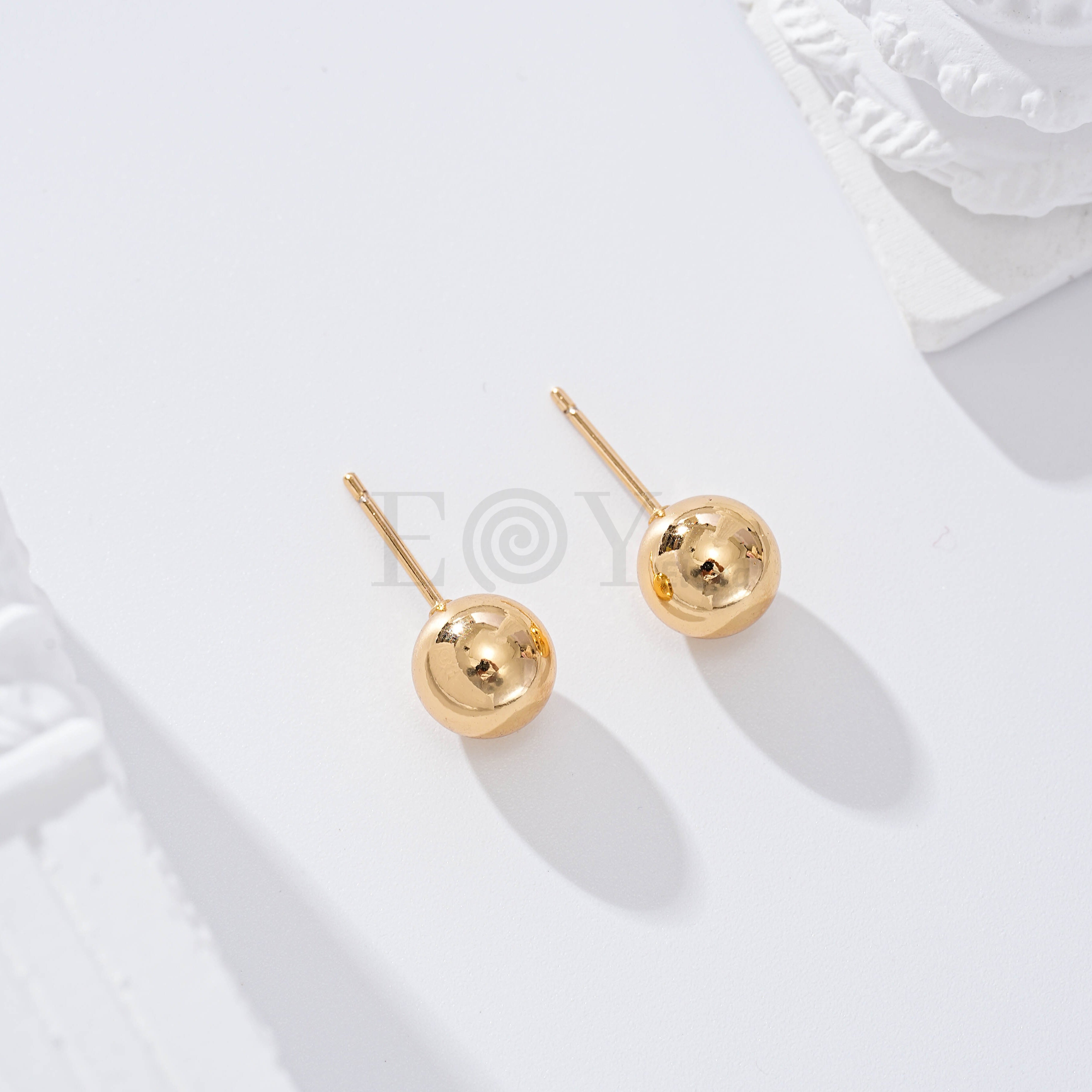 Pendientes bola goldfield