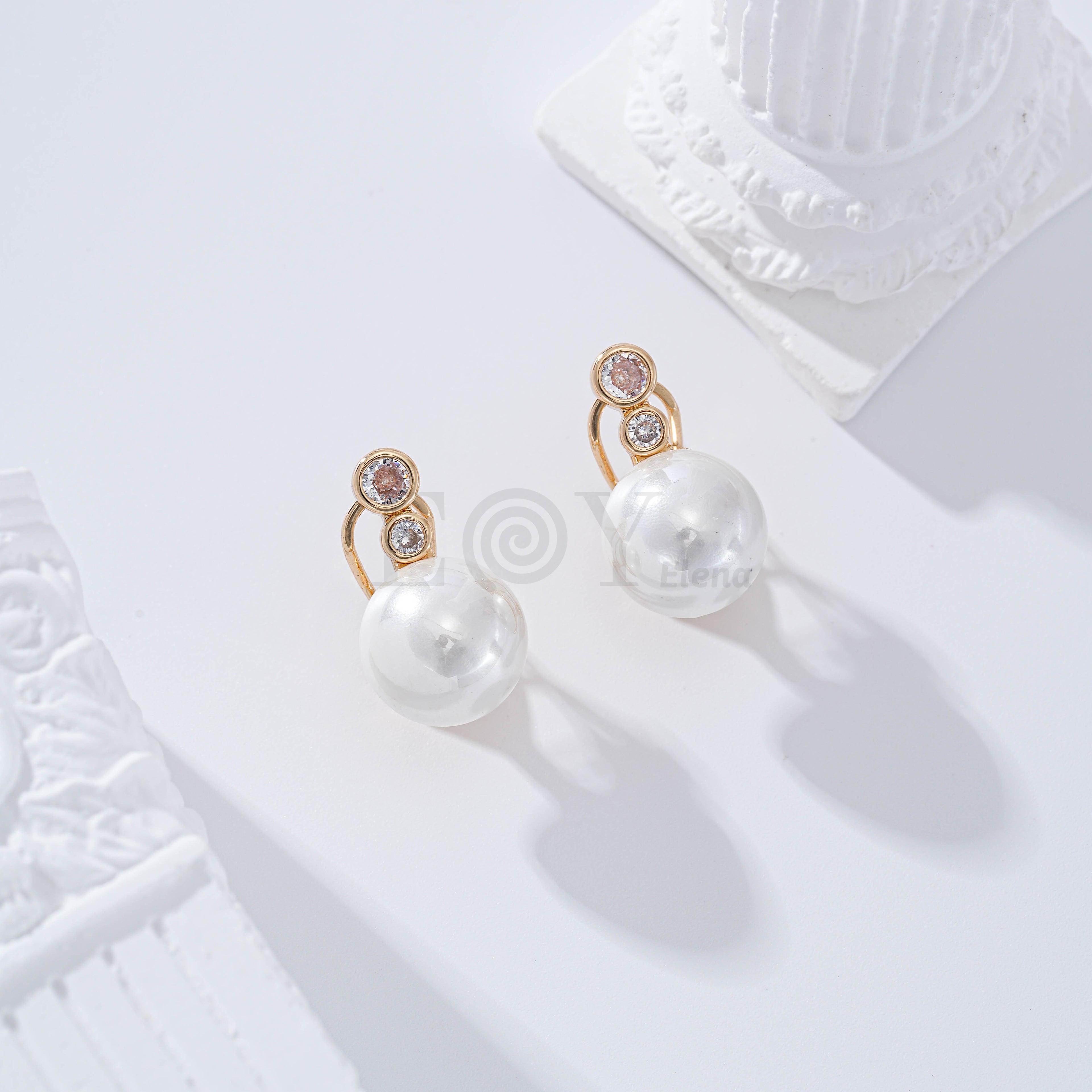 Pendientes circonita y perla cierre omega goldfield
