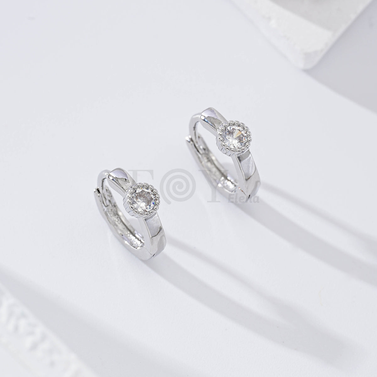 Gold-filled hoop with round zirconia