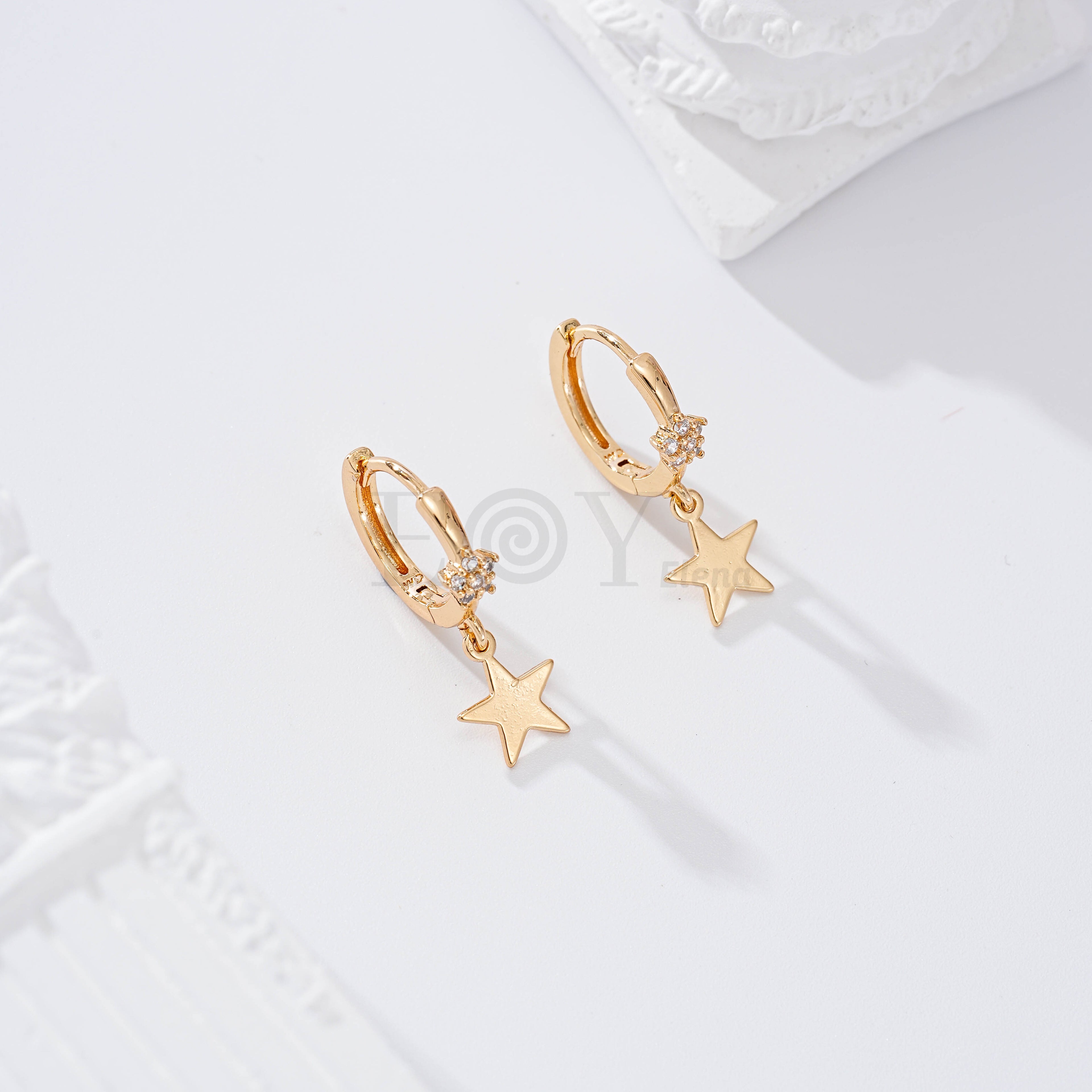 Pendientes de aro circonita y estrella goldfield