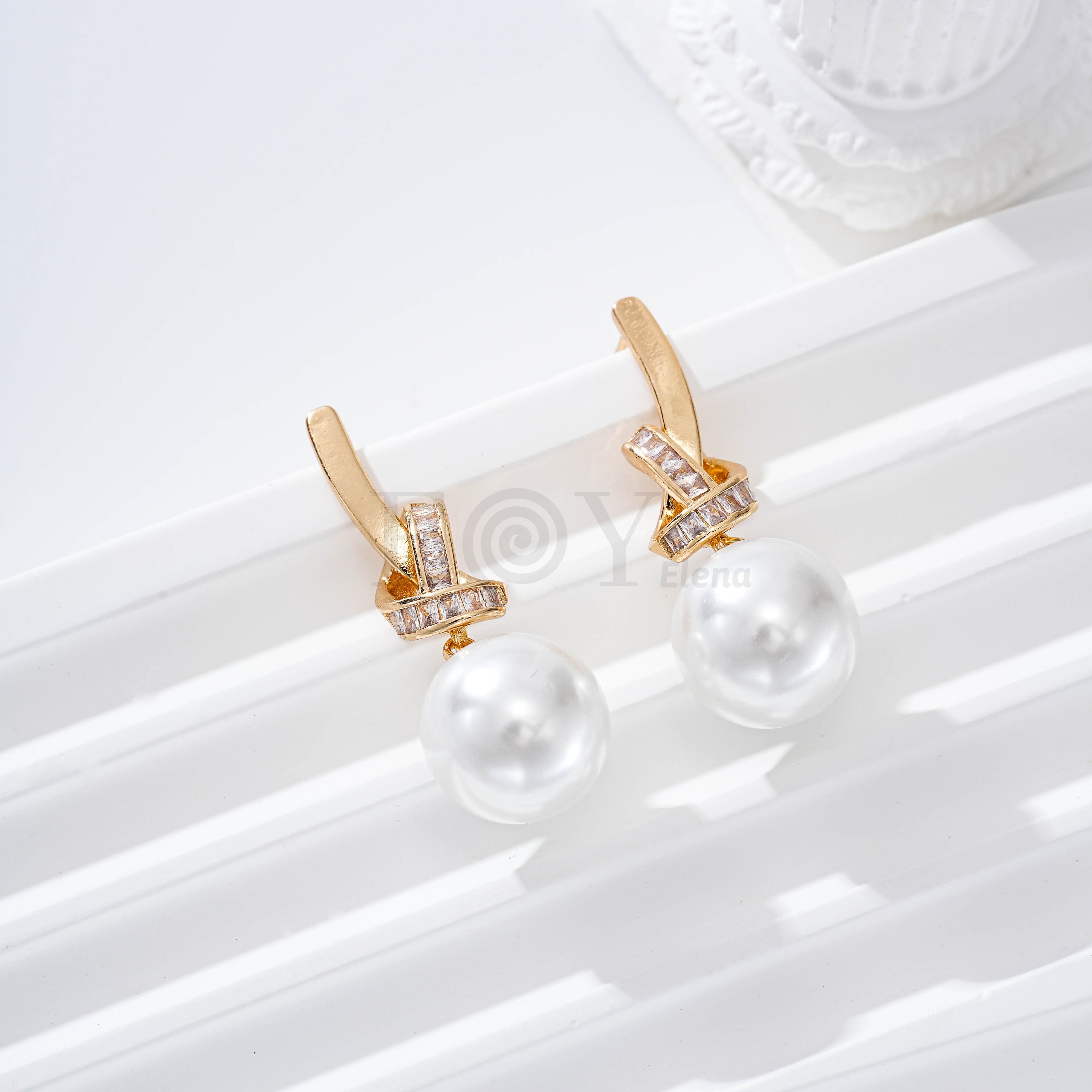 Pendientes nudo con perla goldfield