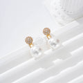 Pendientes circonitas y perla goldfield