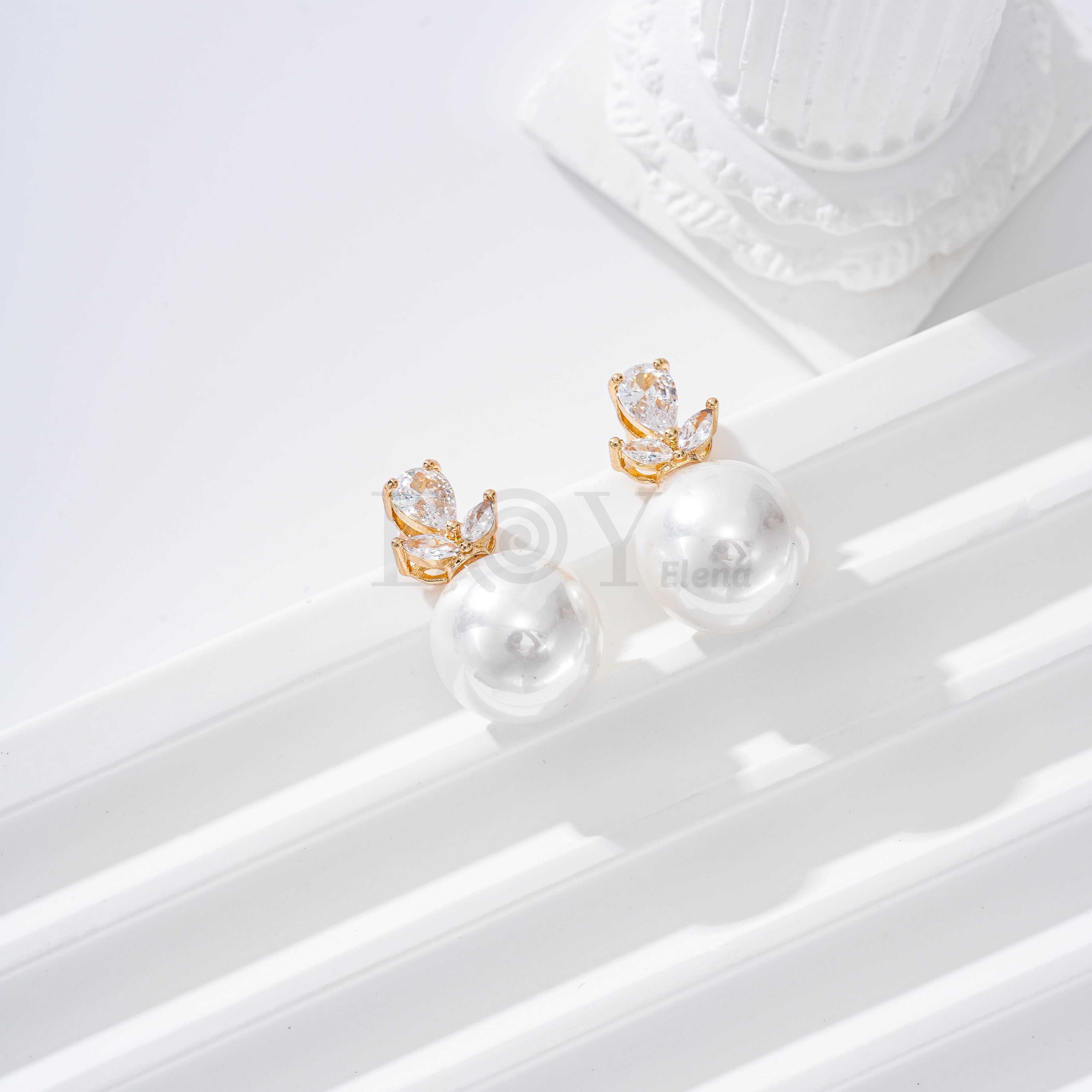 Pendientes flor y perla goldfield