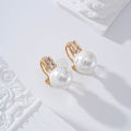 Pendientes piedra y perla cierra omega goldfield