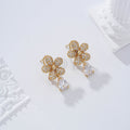 Pendientes flor y piedra cierre omega goldfield