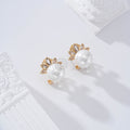 Pendientes perlas cierre omega goldfield