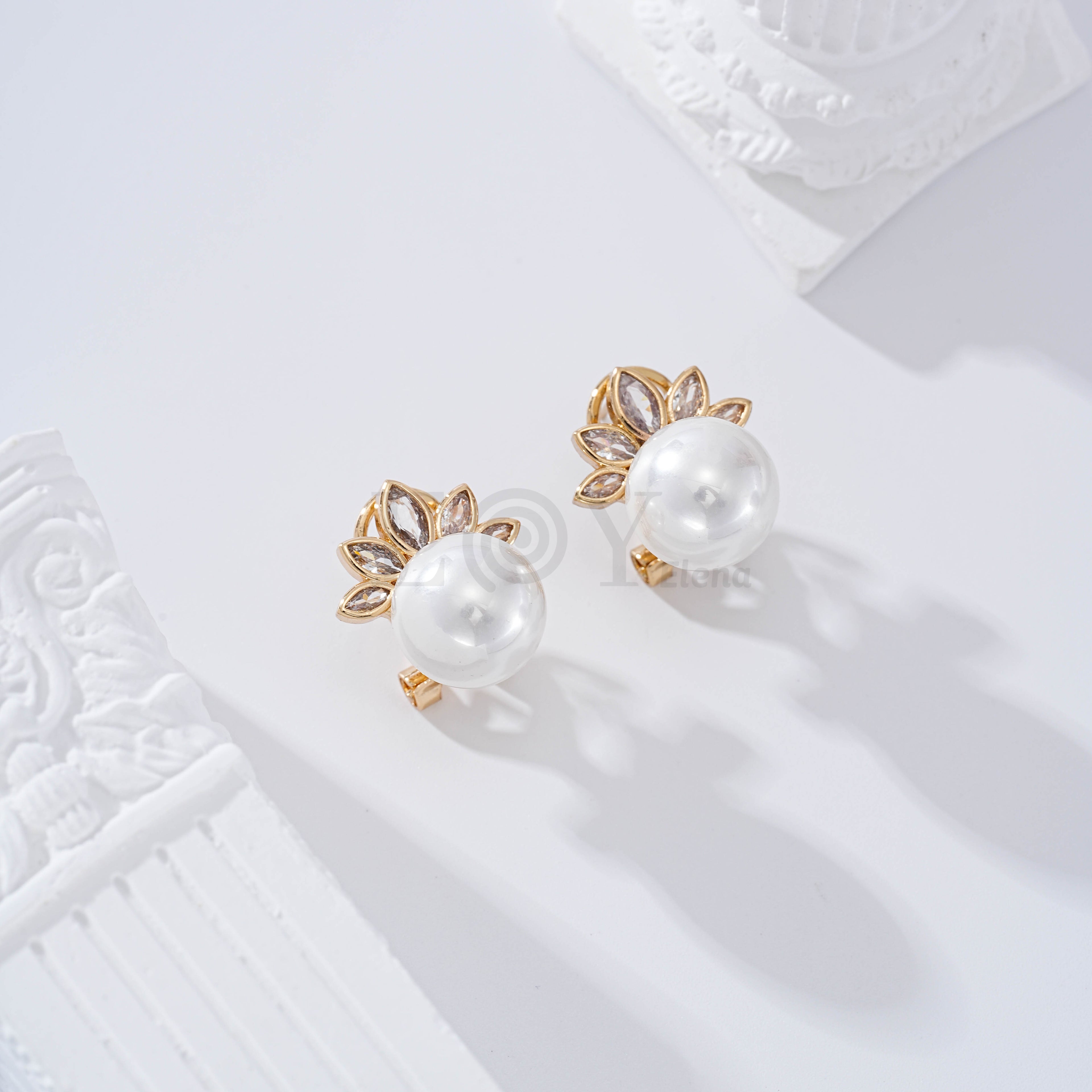 Pendientes perlas cierre omega goldfield