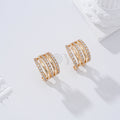 Pendientes con circonitas cierre omega gold-filled