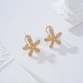 Pendientes flor cierre omega gold-filled