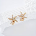 Pendientes estrella circonitas pinza gold-filled