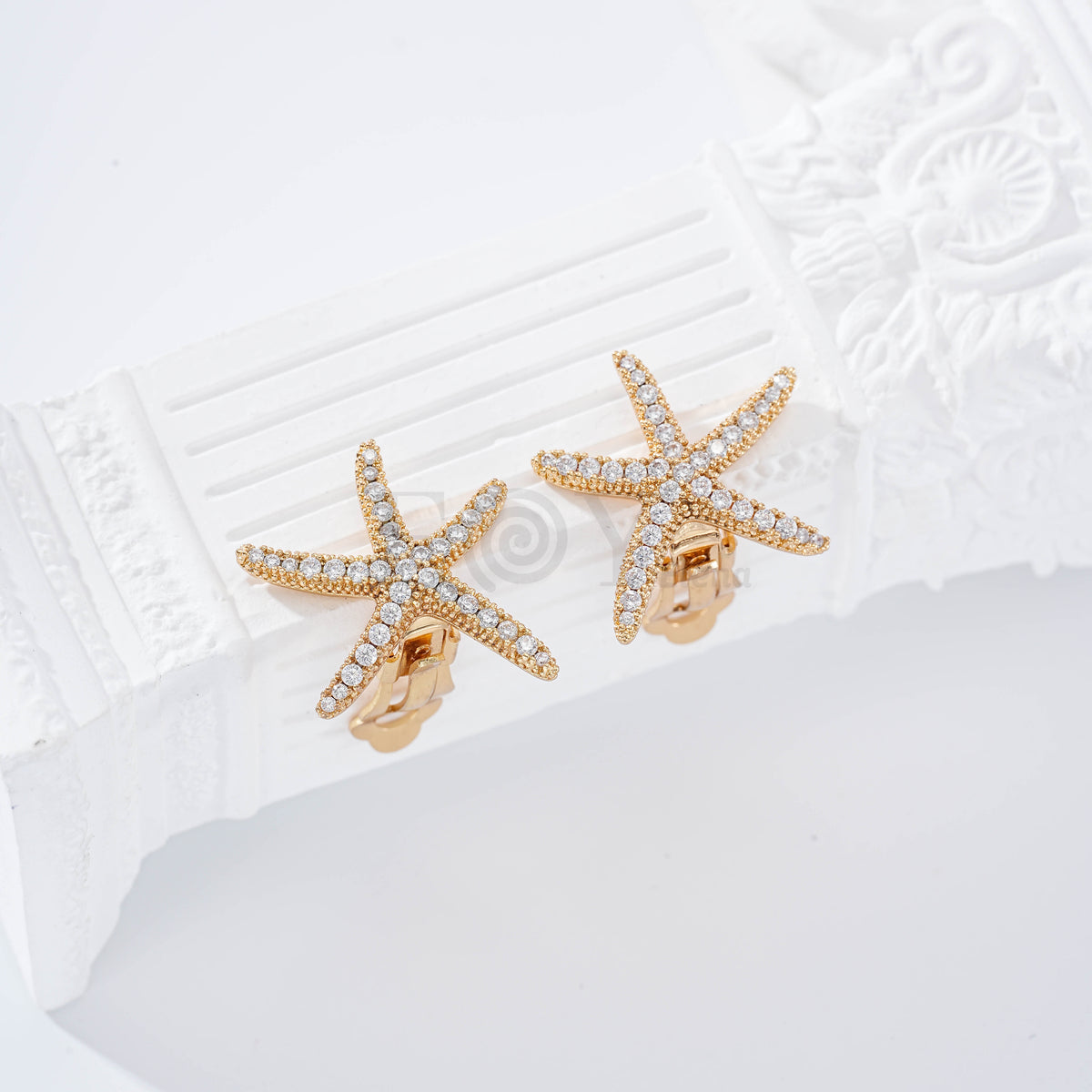 Pendientes estrella circonitas pinza gold-filled