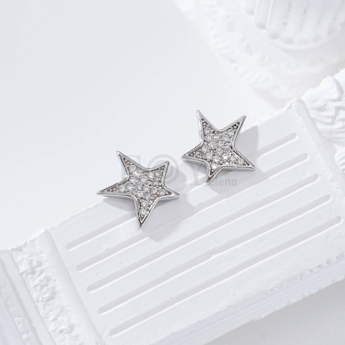 Pendientes estrella irregular circonitas gold-filled