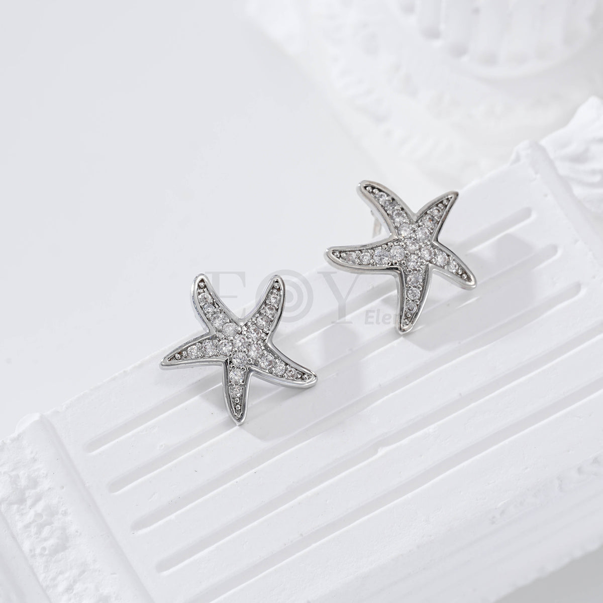 Pendientes estrella de mar circonitas gold-filled