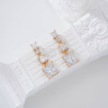 Peendientes con circonitas cuadradas gold-filled