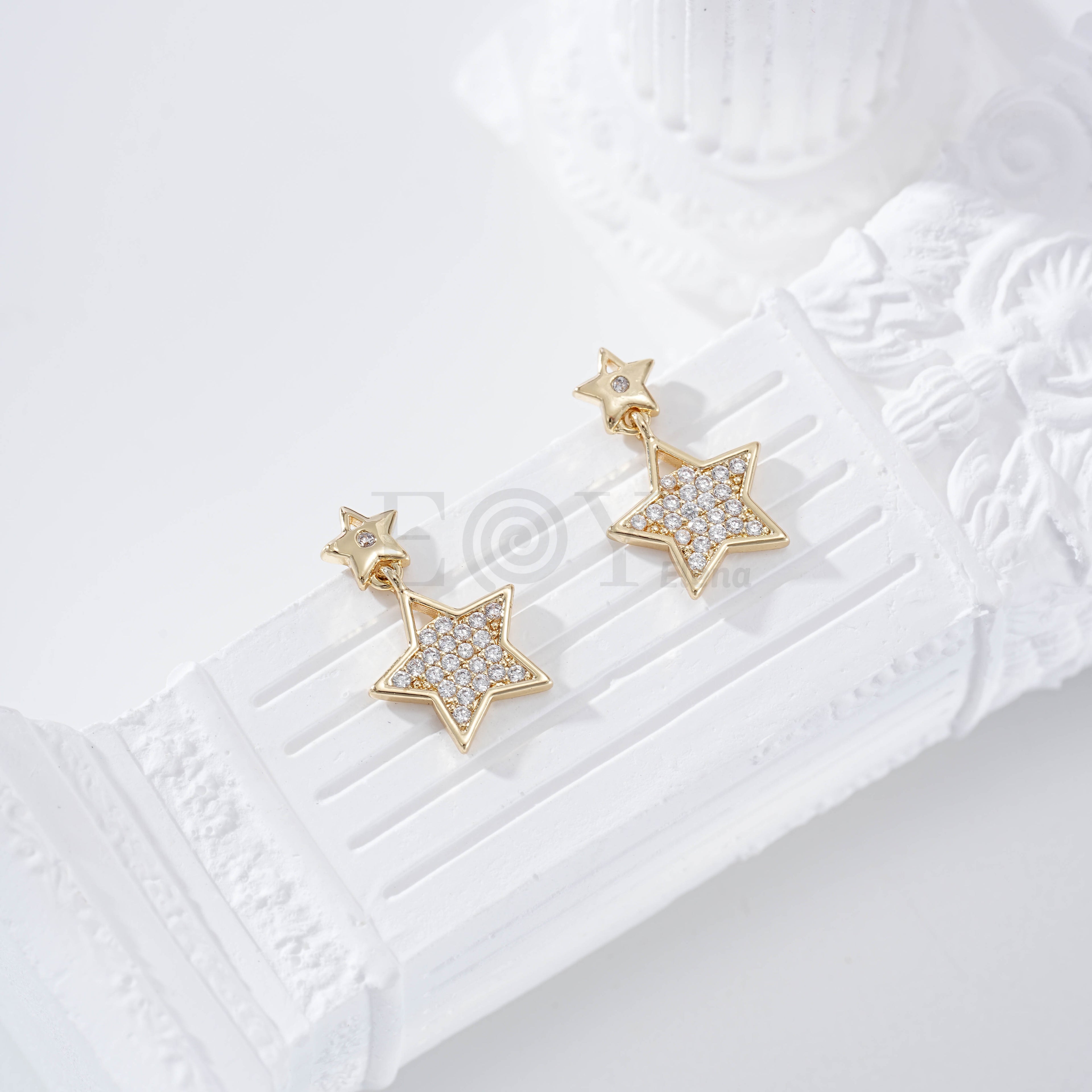 Pendientes doble estrella circonita goldfield
