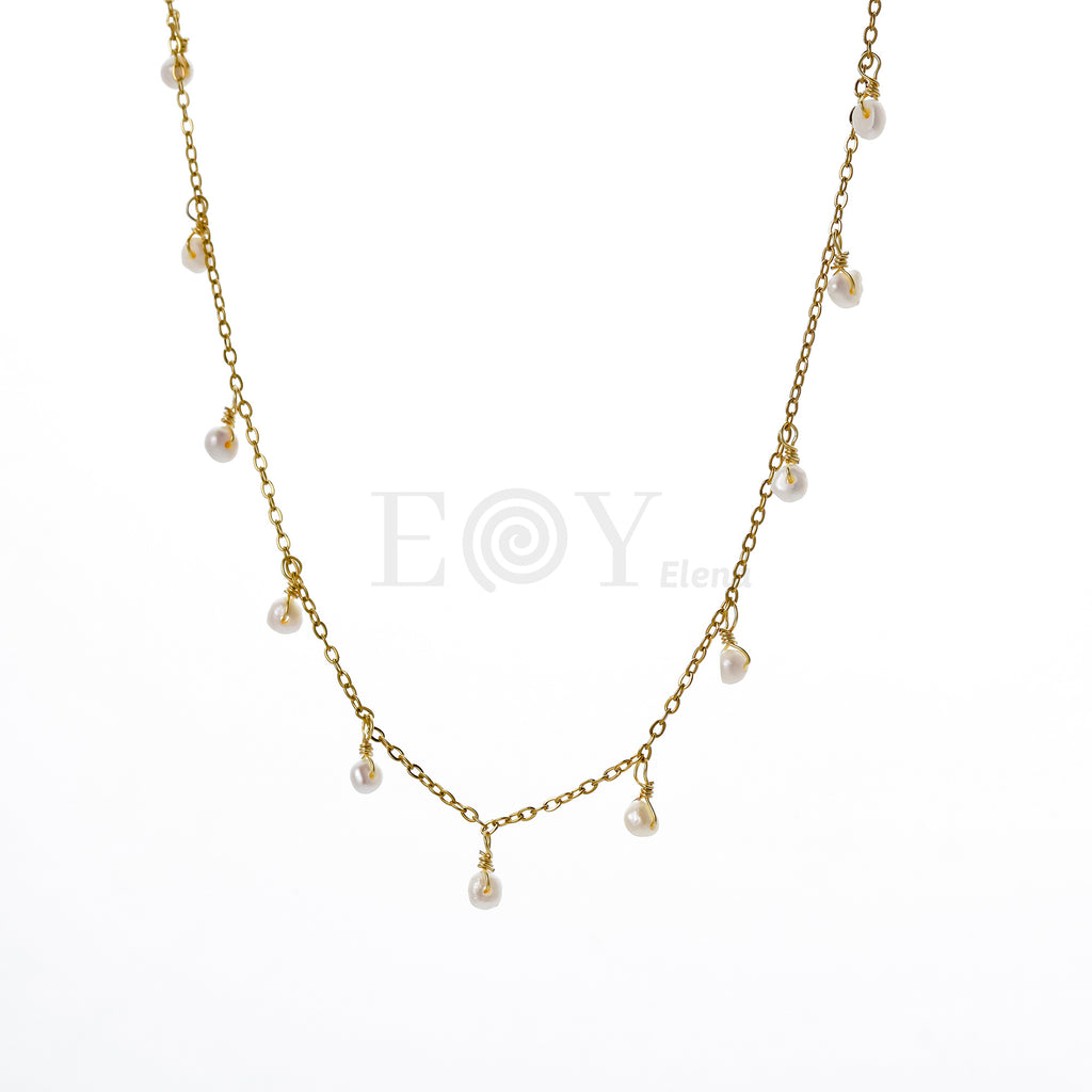 Collar con perlas colgantes