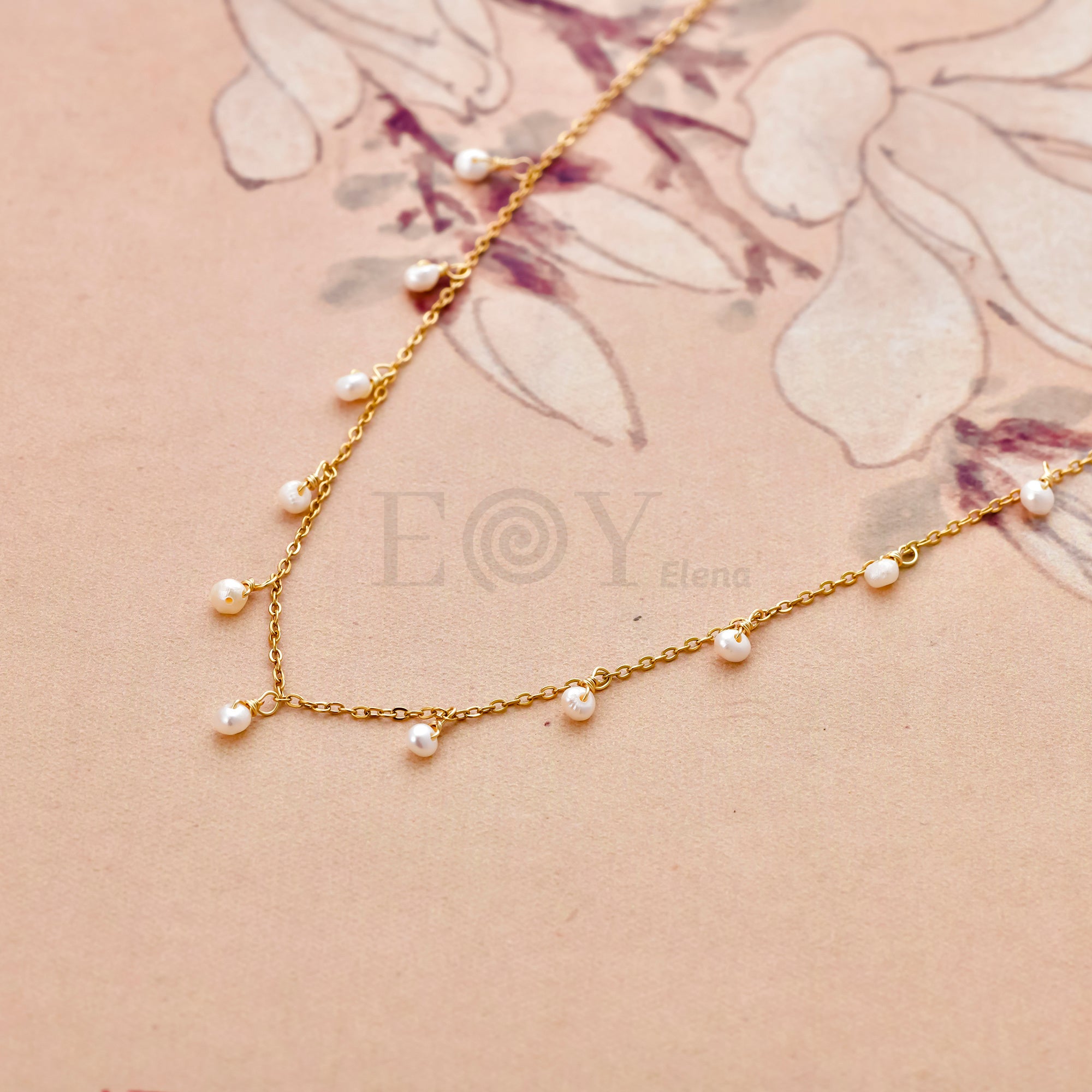 Collar con perlas colgantes