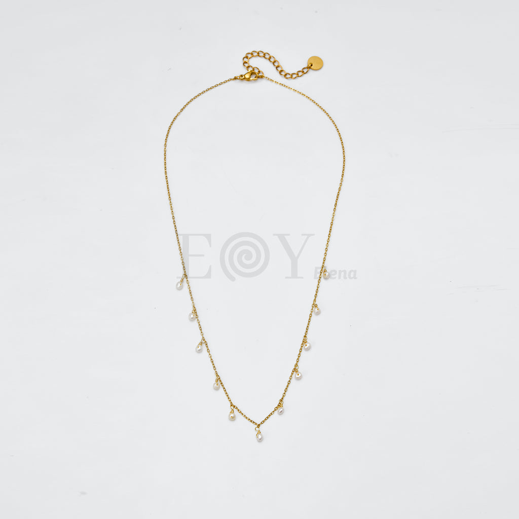 Collar con perlas colgantes