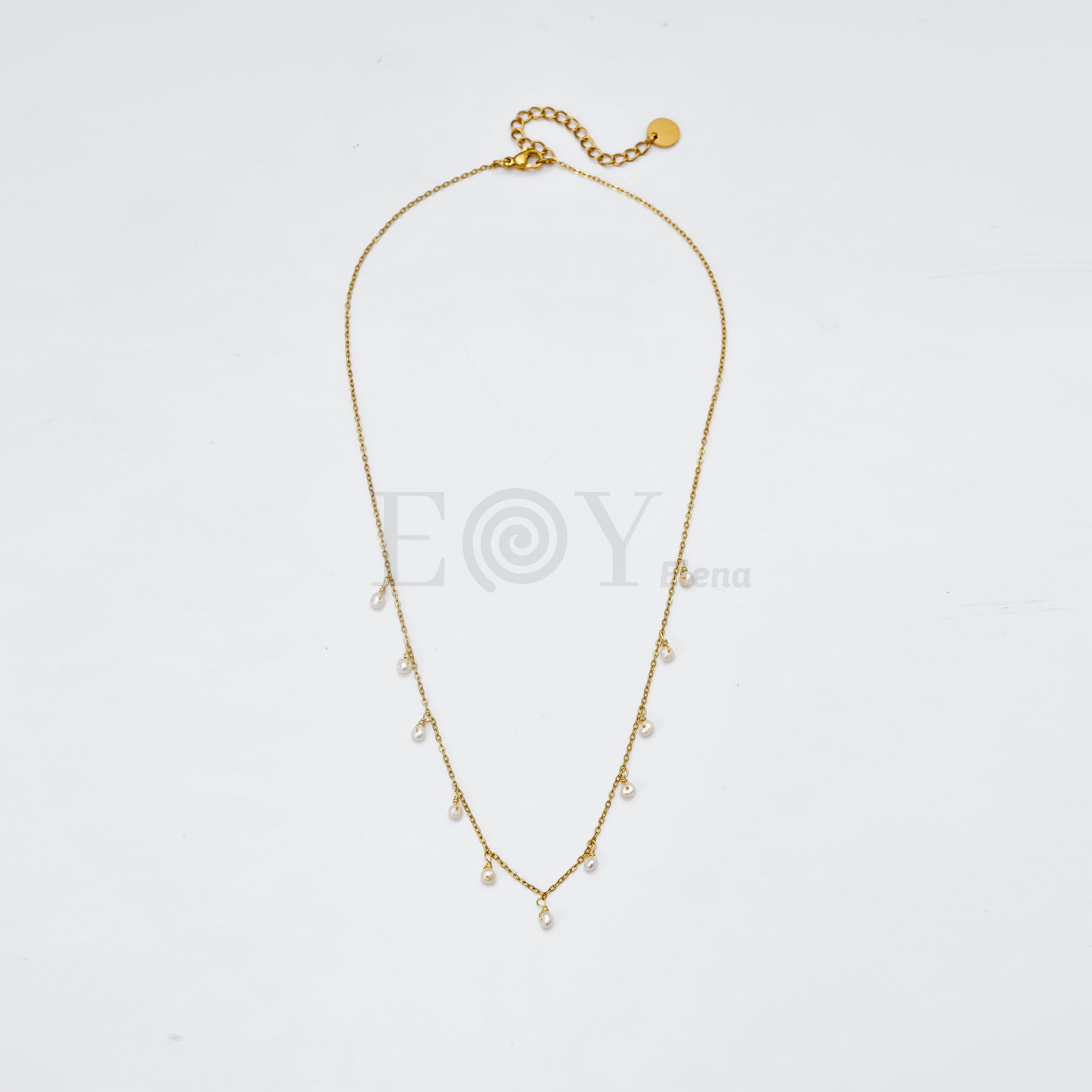 Collar con perlas colgantes