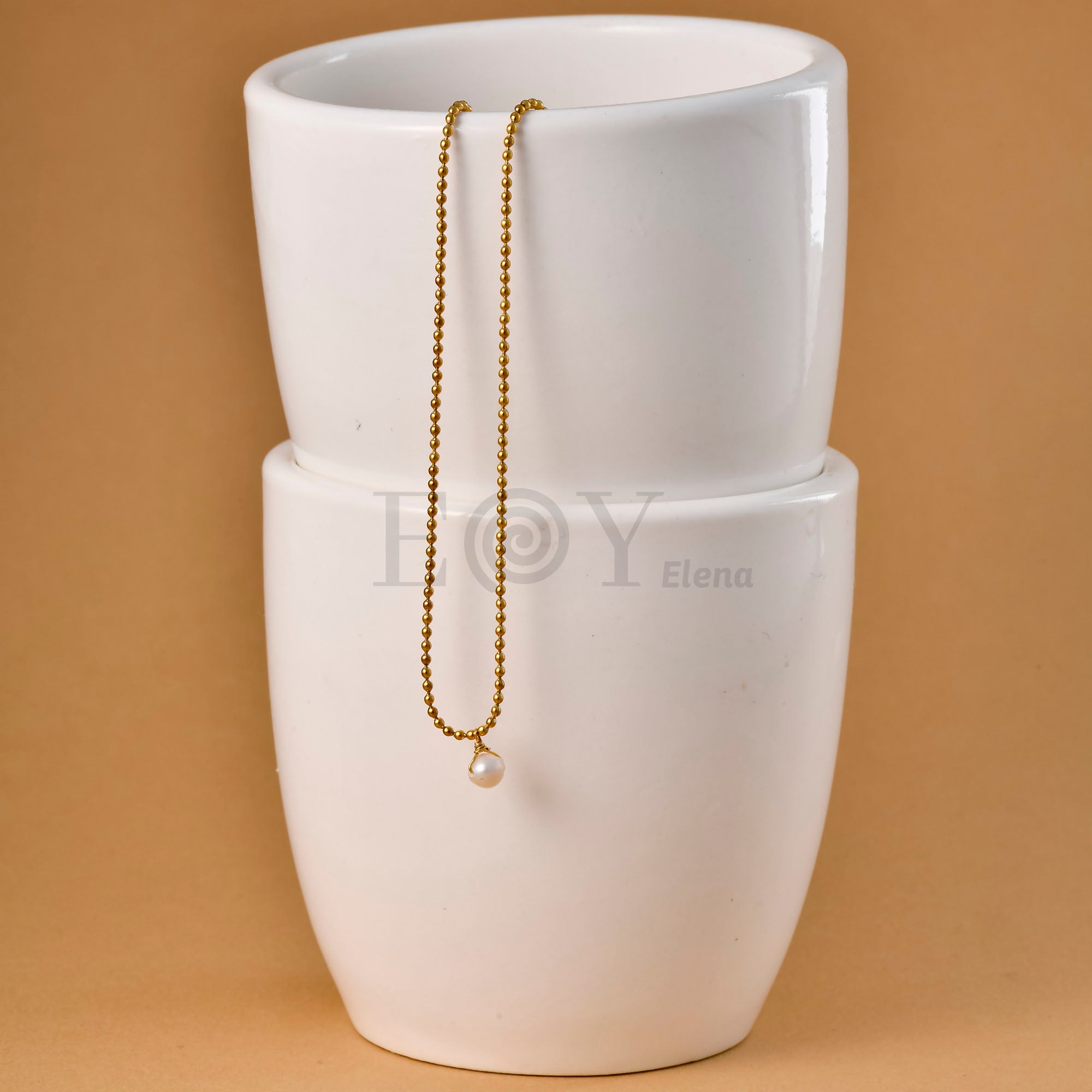 Collar con Perla Colgante de Acero