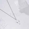 Collar cruz nacar acero