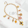 Collar cruz y charms