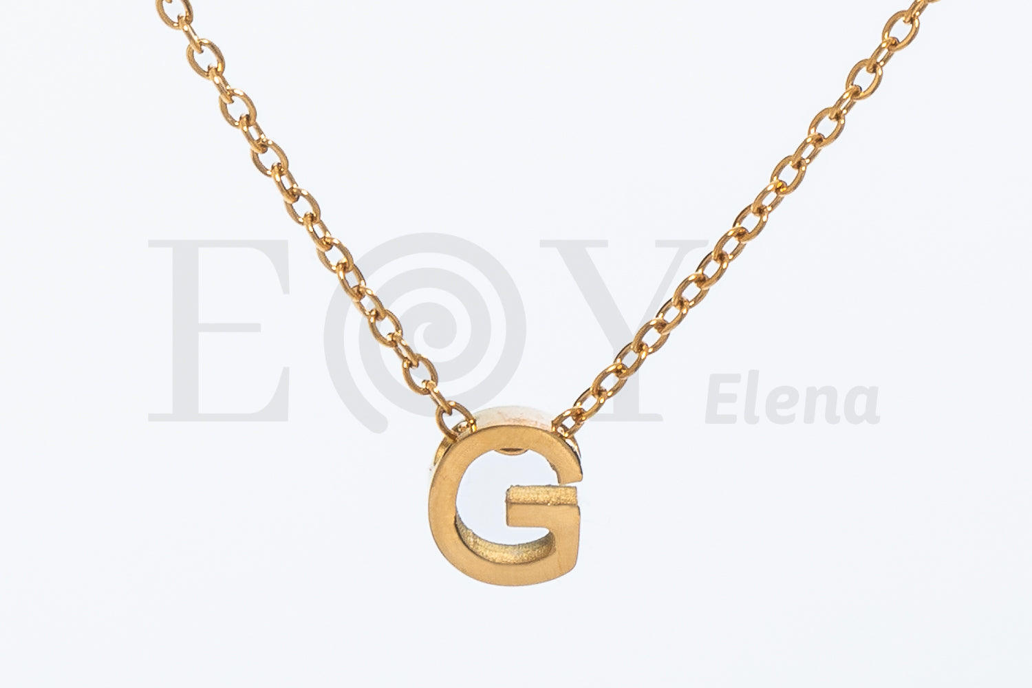 Collar de letra "G"