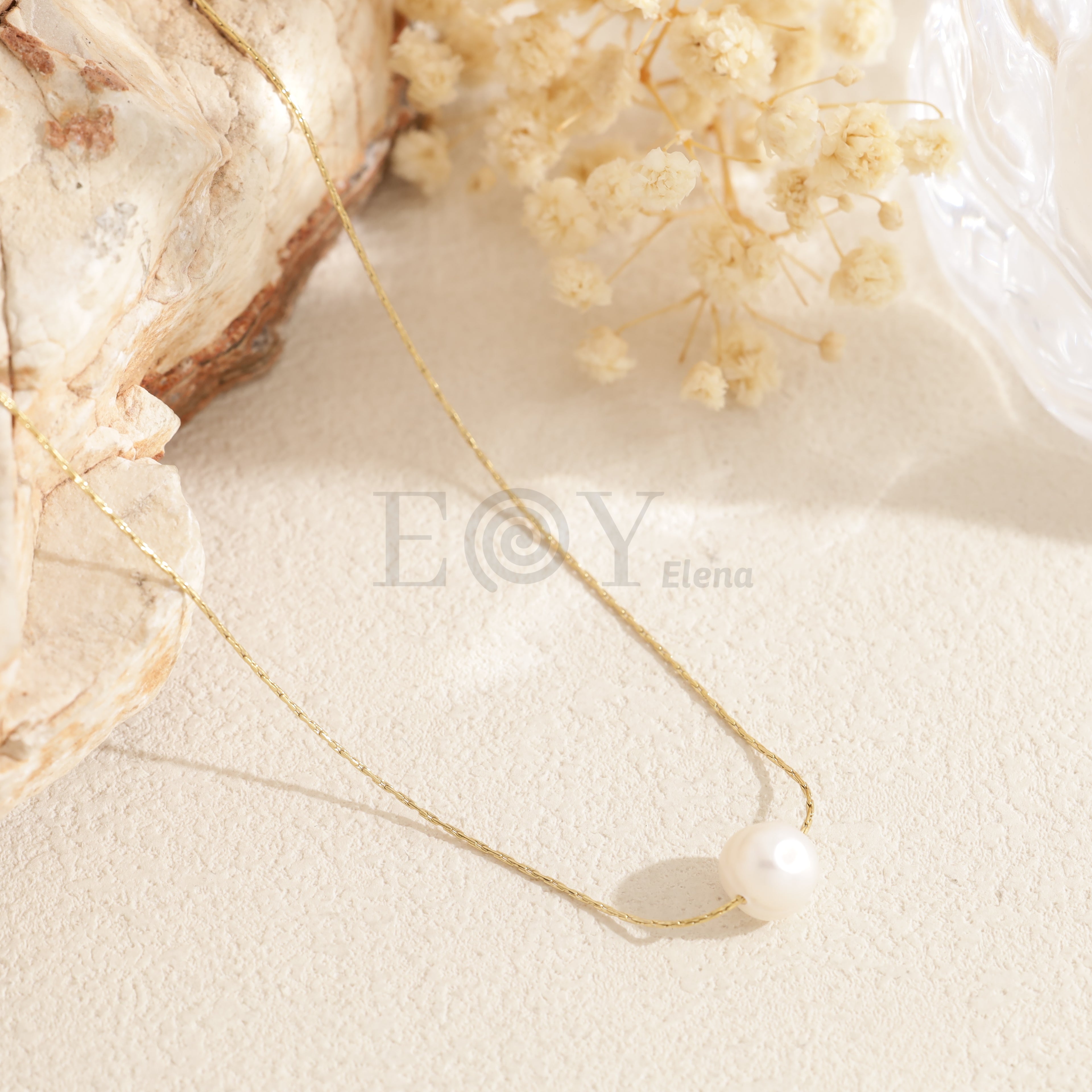 Collar fino con perla