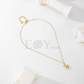 Collar dorado con perro globo