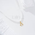 Pearl necklace with the Virgin of El Rocío