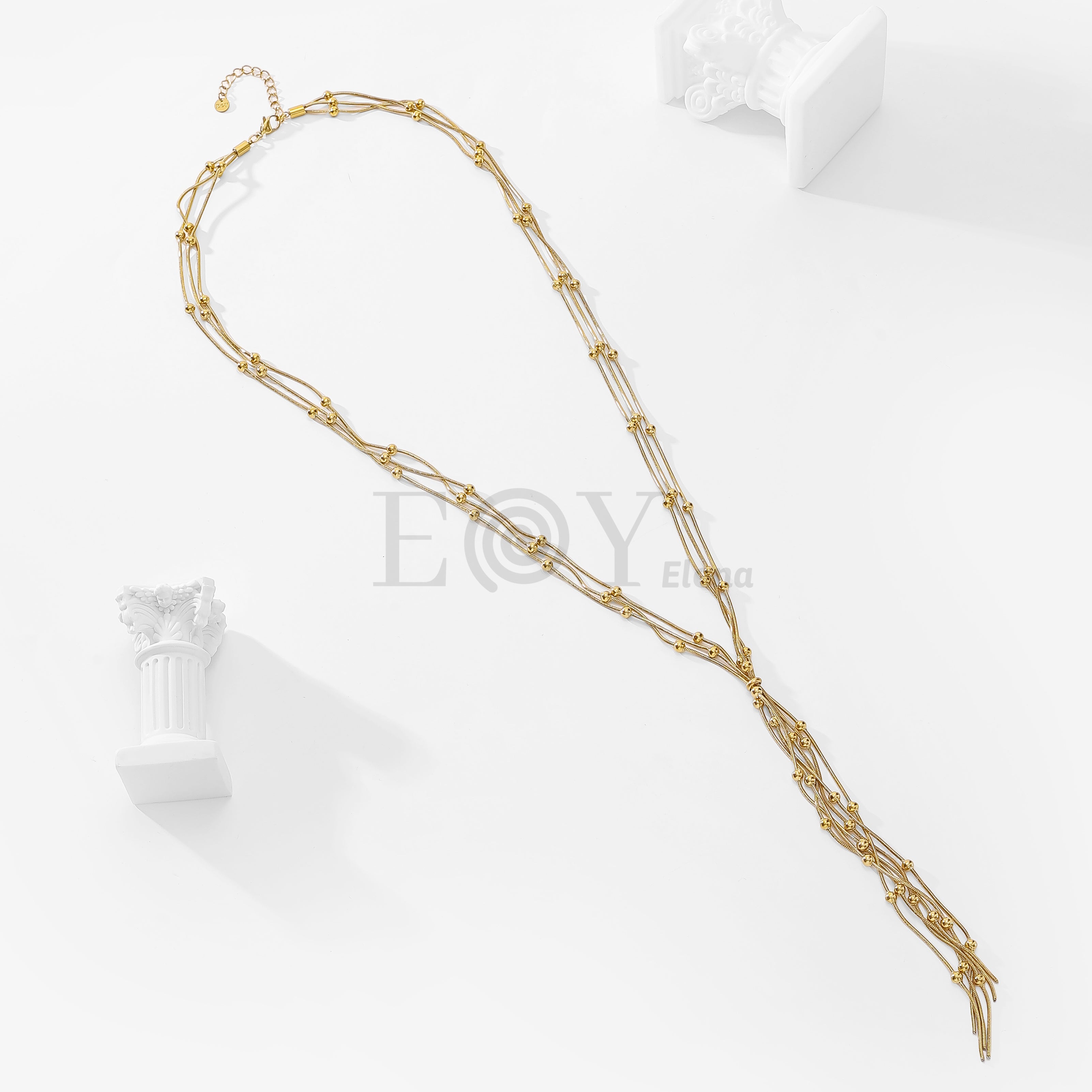 Cadena larga con bolitas