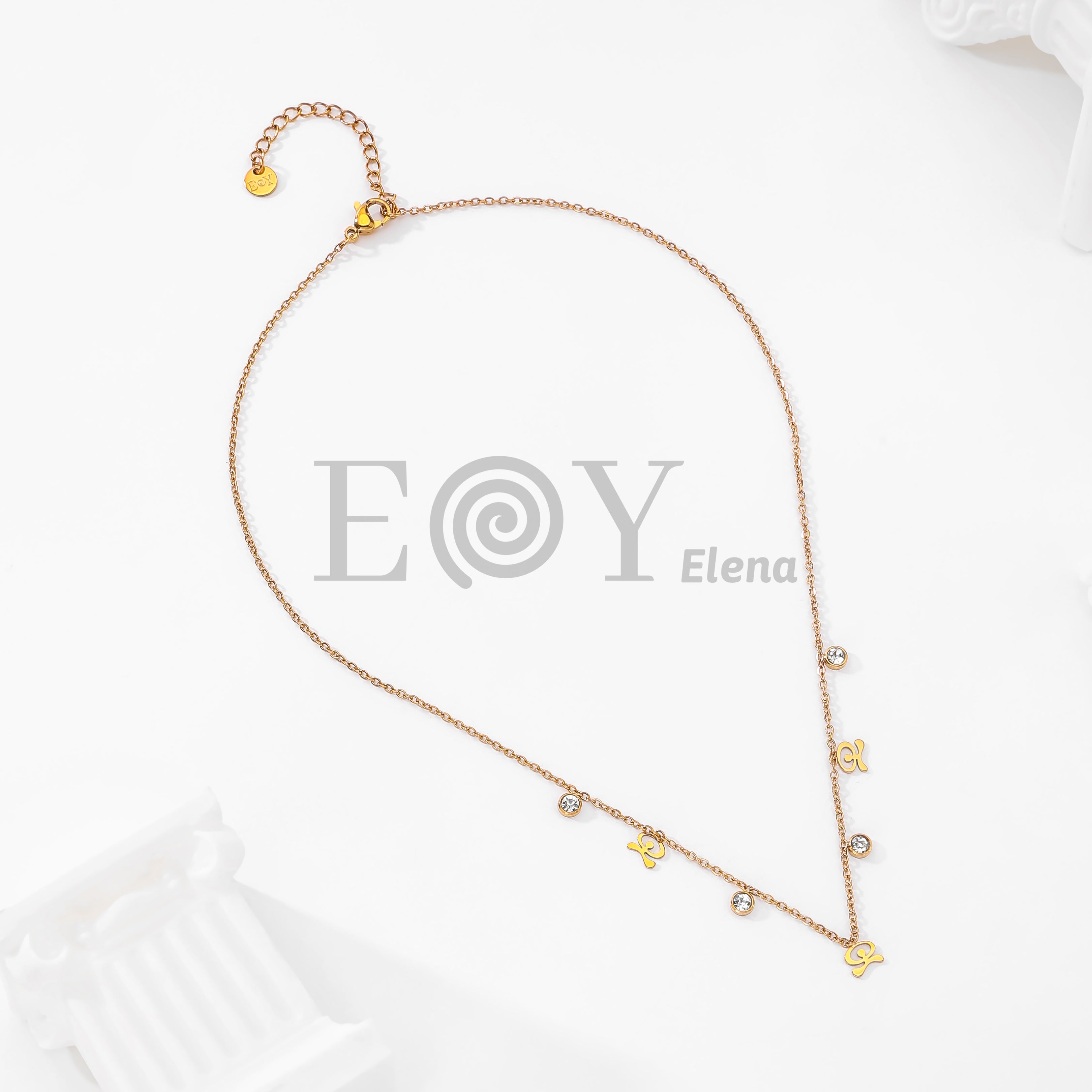 Collar símbolos con circonitas