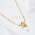 Collar con perla y chapas acero