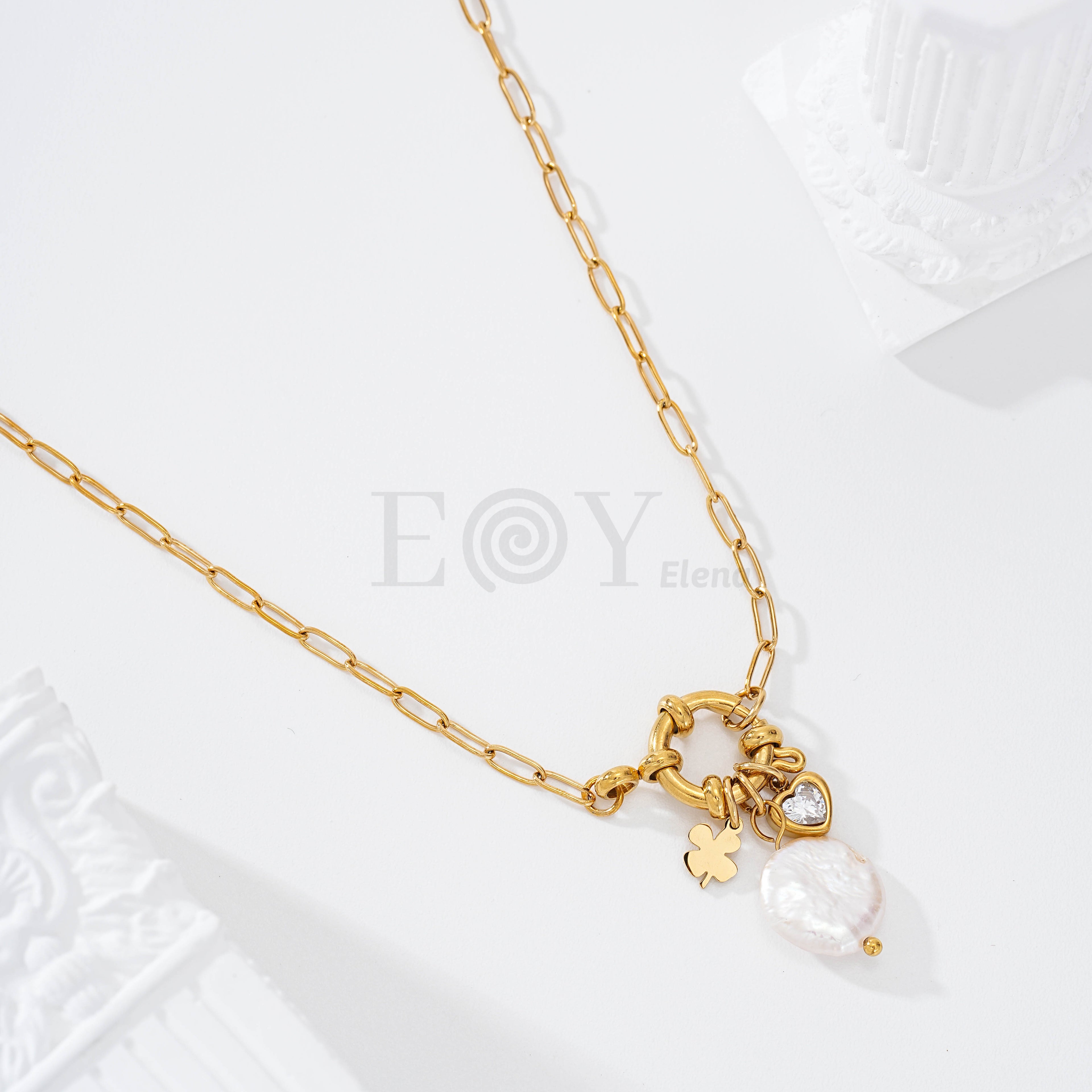 Collar con perla y chapas acero