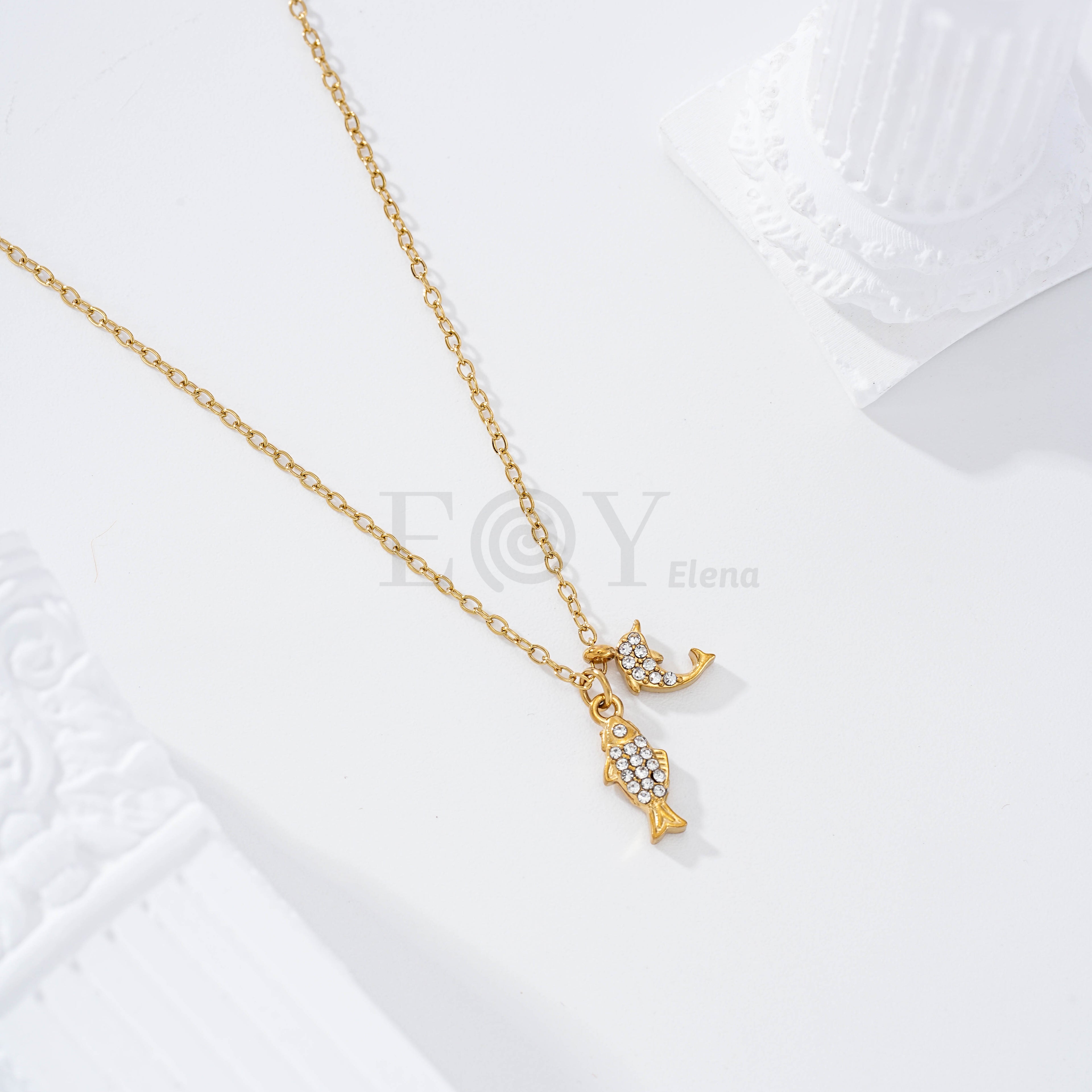 Collar pez y delfín circonitas acero