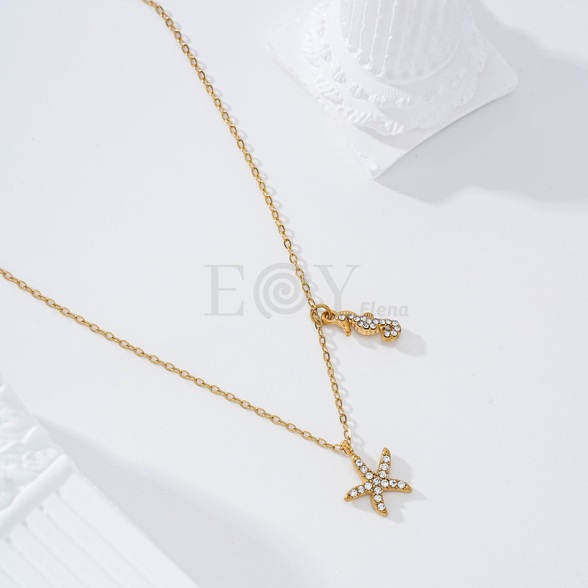Collar estrella y caballito de mar circonitas acero