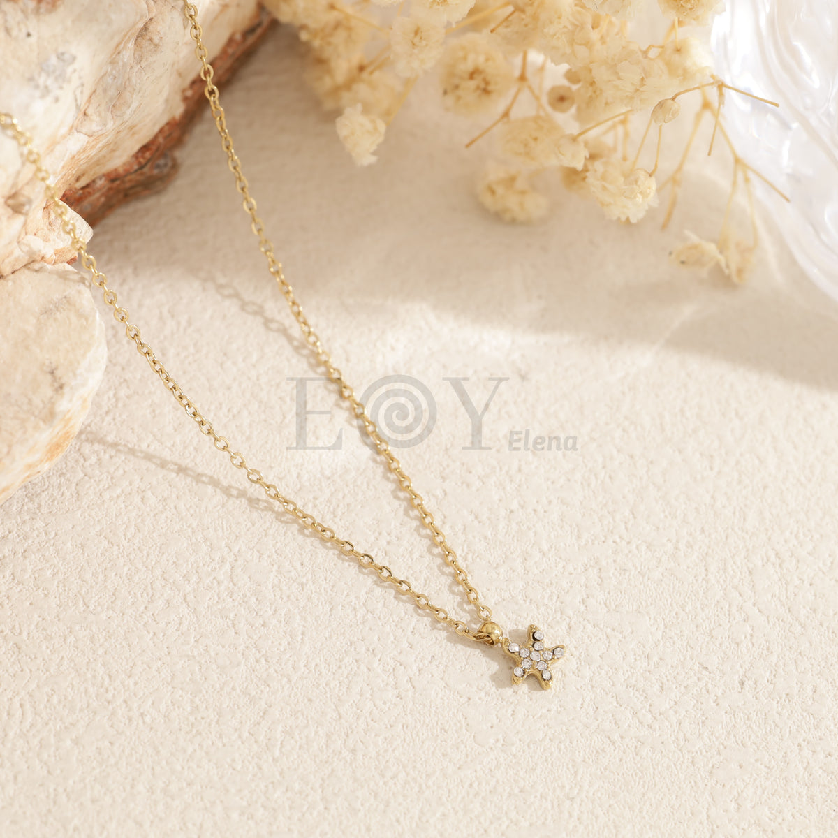 Collar estrella mar circonitas acero