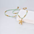 Collar Estrella de Mar con Piedras Verdes de Acero Dorado