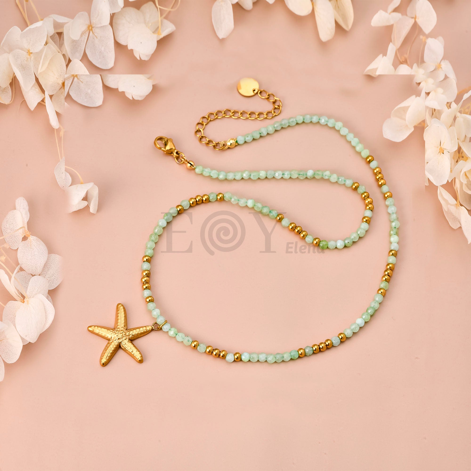 Collar Estrella de Mar con Piedras Verdes de Acero Dorado