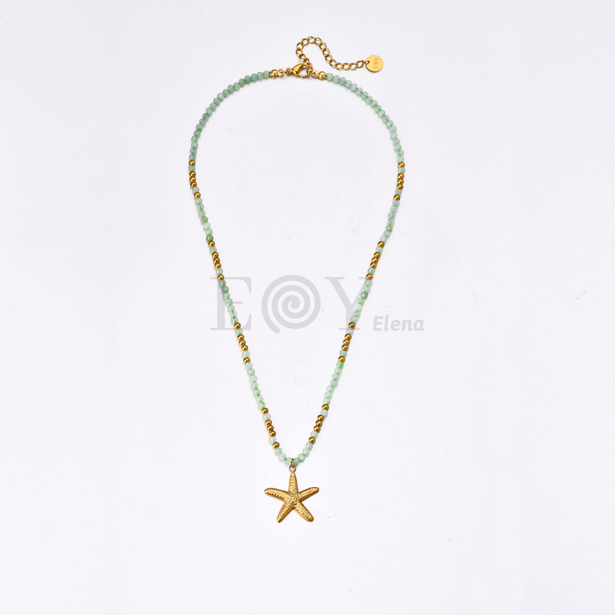 Collar Estrella de Mar con Piedras Verdes de Acero Dorado