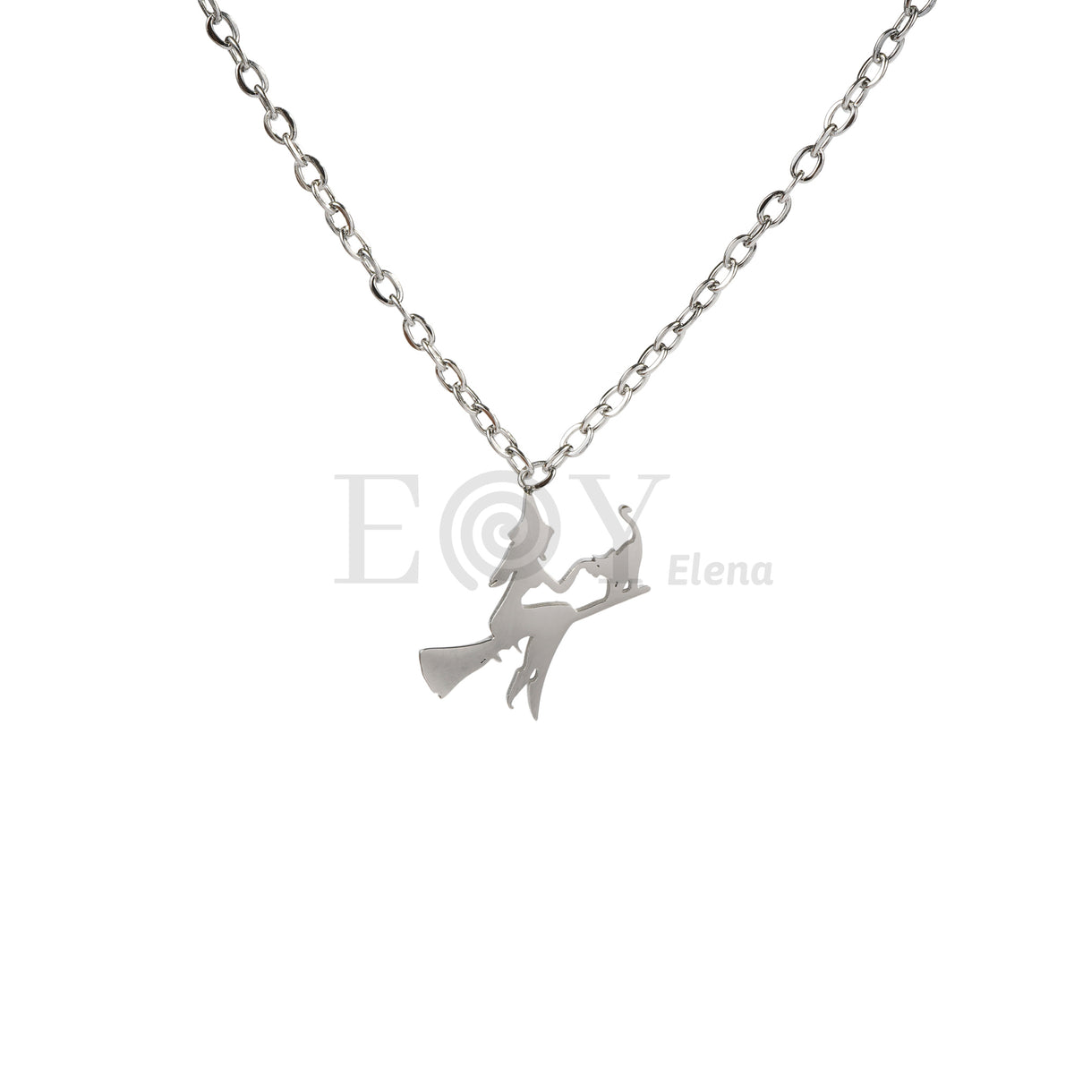 Collar bruja sobre escoba acero