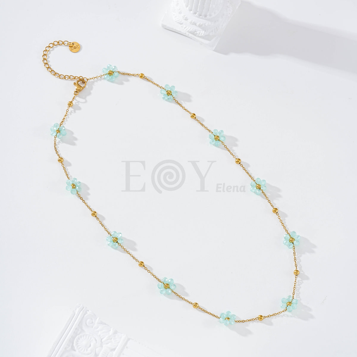 Collar flores color acero